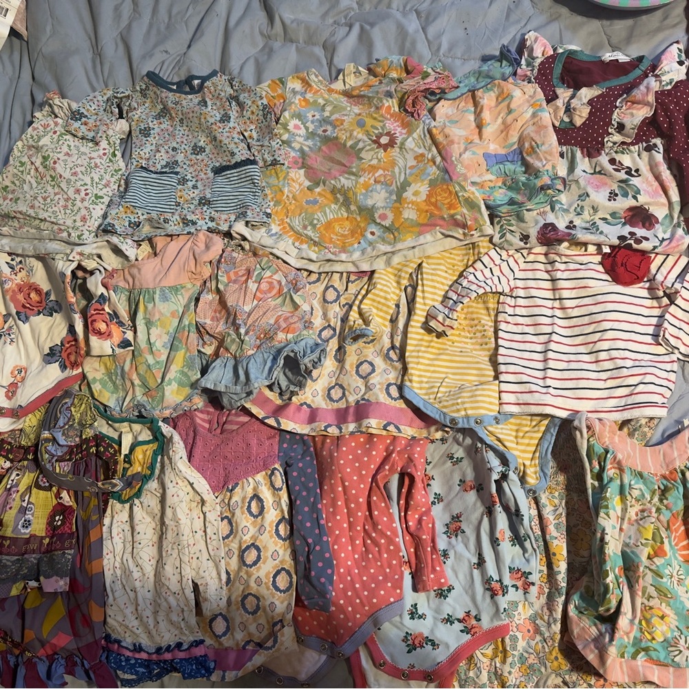 Matilda Jane clothes and a few other brands. Over 15 tops and onesies.